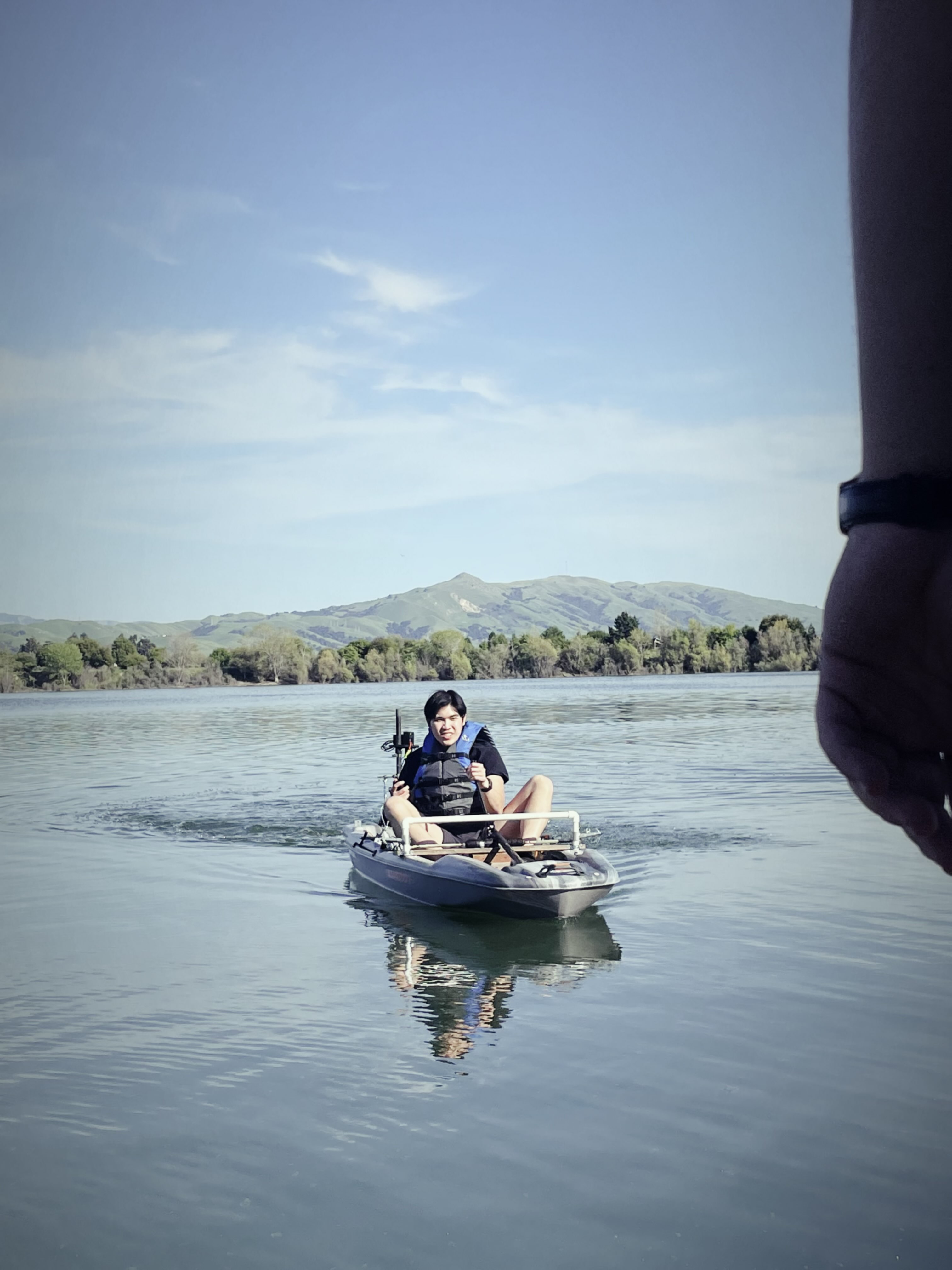 Driver riding the boat in water